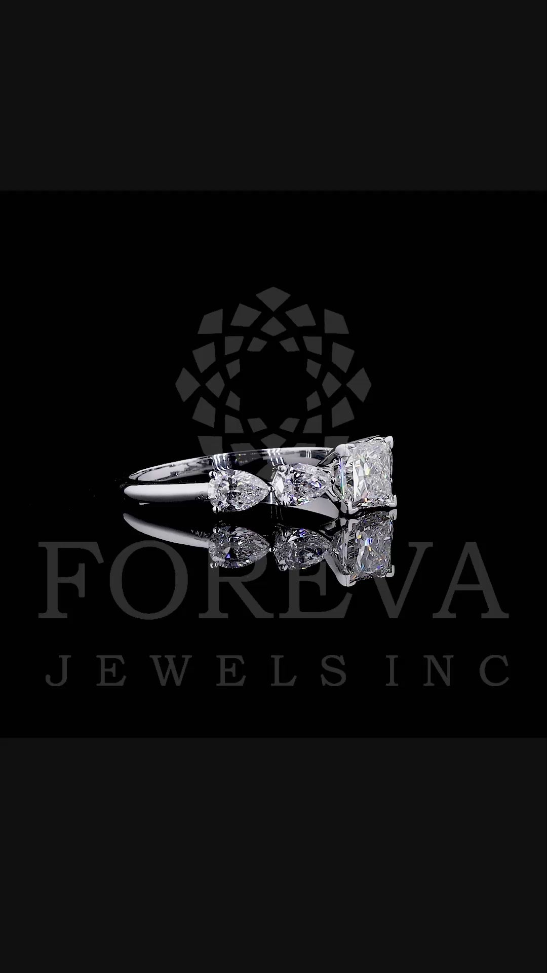 PRINCESS CROWN RING EMBRACED BY PEAR CUT SOLITAIRE LAB GROWN DIAMOND