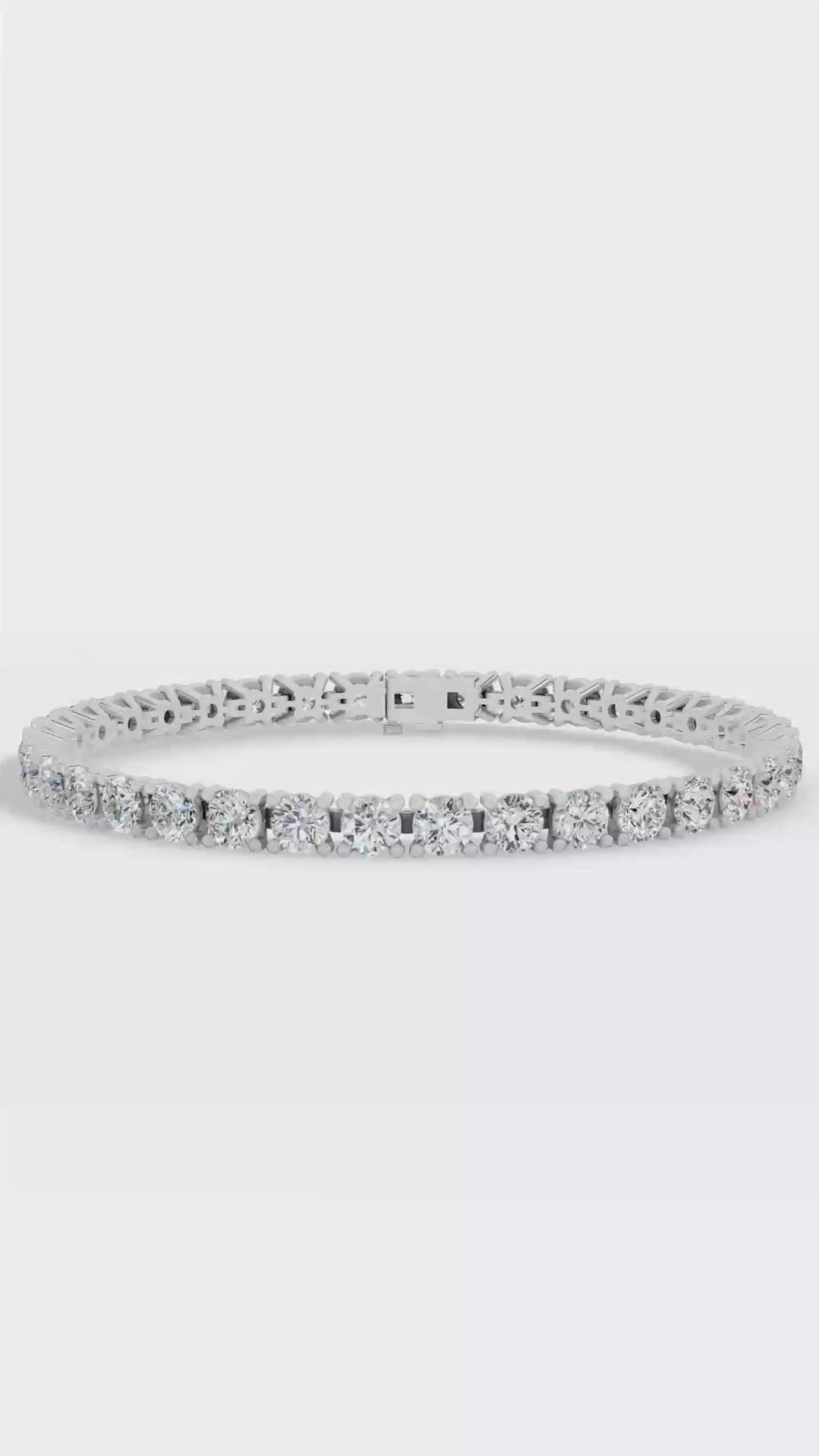 Elongated Four Prong Round Tennis Bracelet Moissanite and Sterling Silver 12.4 CTW