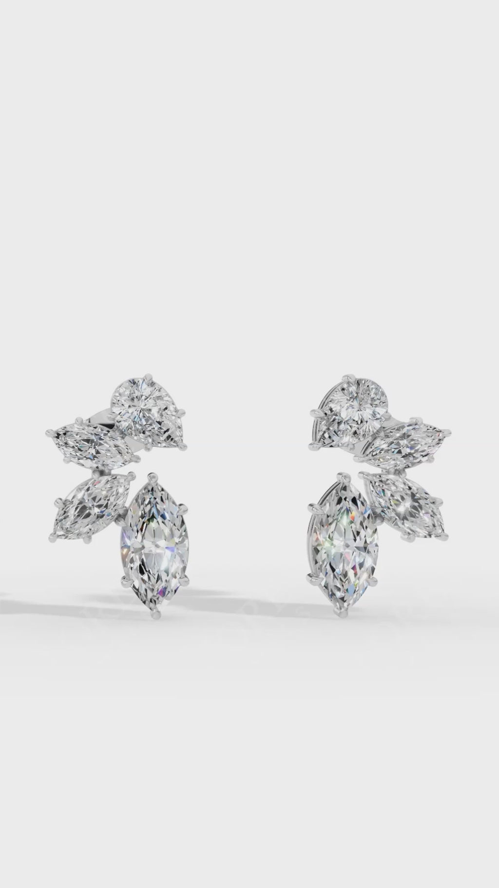 Multi-Stone Stud Earrings With Combination Of Marquise And Pear Cut 10K White Gold 1.3 CTW