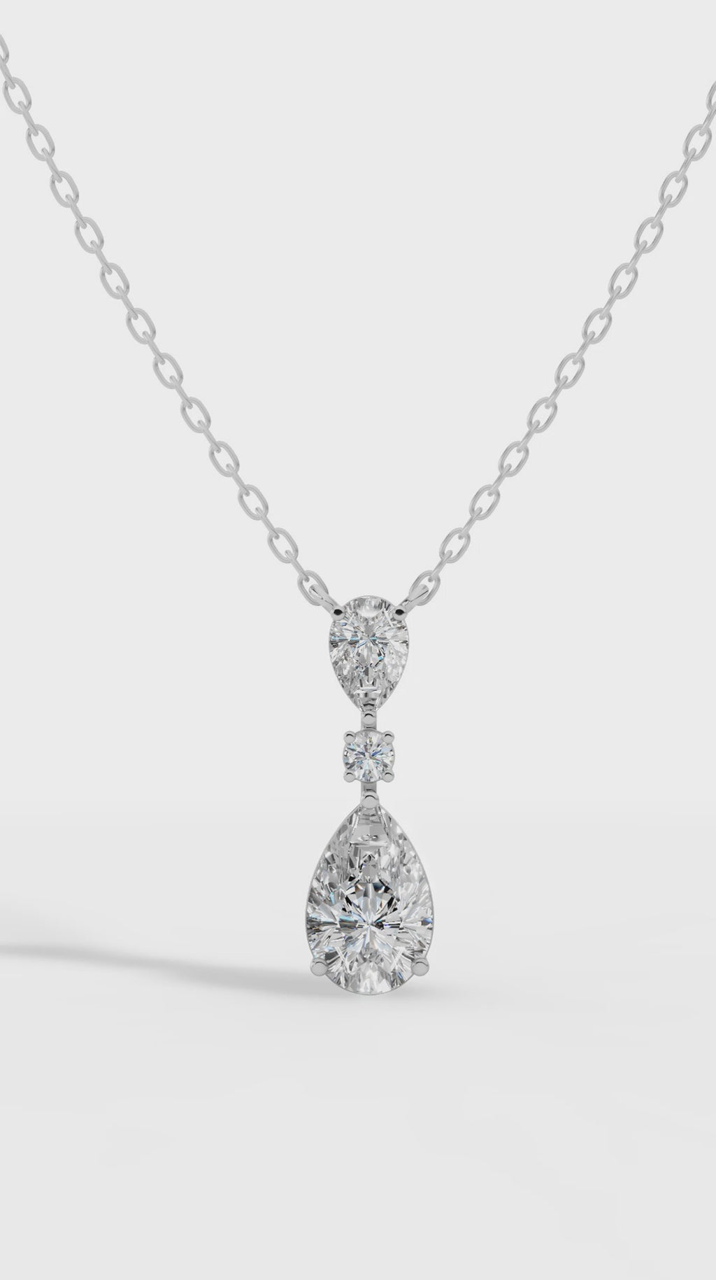 Tear Drop Three Stone Necklace Embracing Perfect Pear And Round Cut With Chain 10K Yellow Gold 2.5 CTW