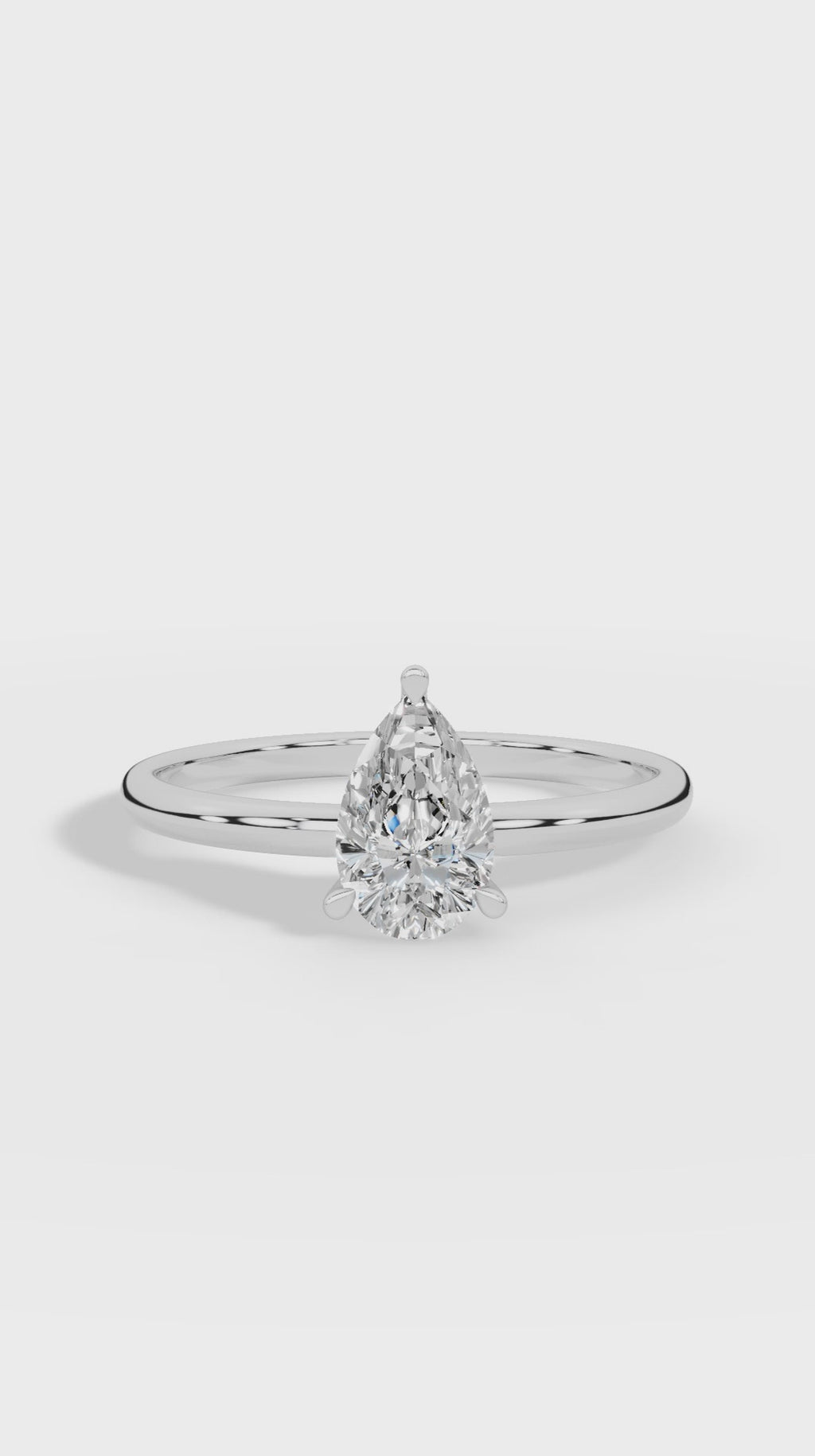 Elongated Three Prong Pear Cut Solitaire 10K White Gold 0.6 CTW