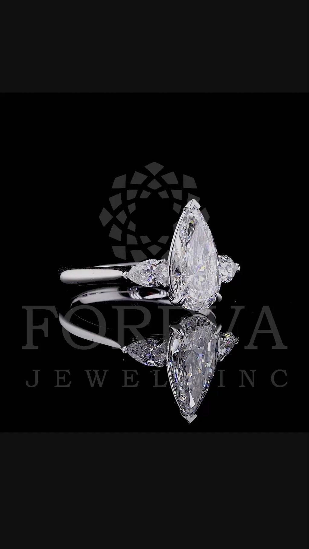 ELONGATED UNIQUE PEAR CUT SOLITAIRE LAB GROWN DIAMOND ENGAGEMENT RING WITH PEAR DIAMOND