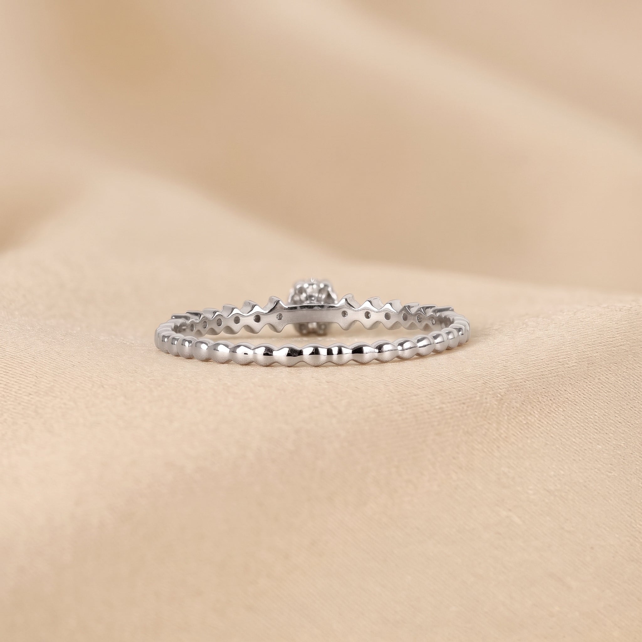 Round Cut Lab Grown Diamond Side Stone Ring in 18K White Gold 0.20 CTW