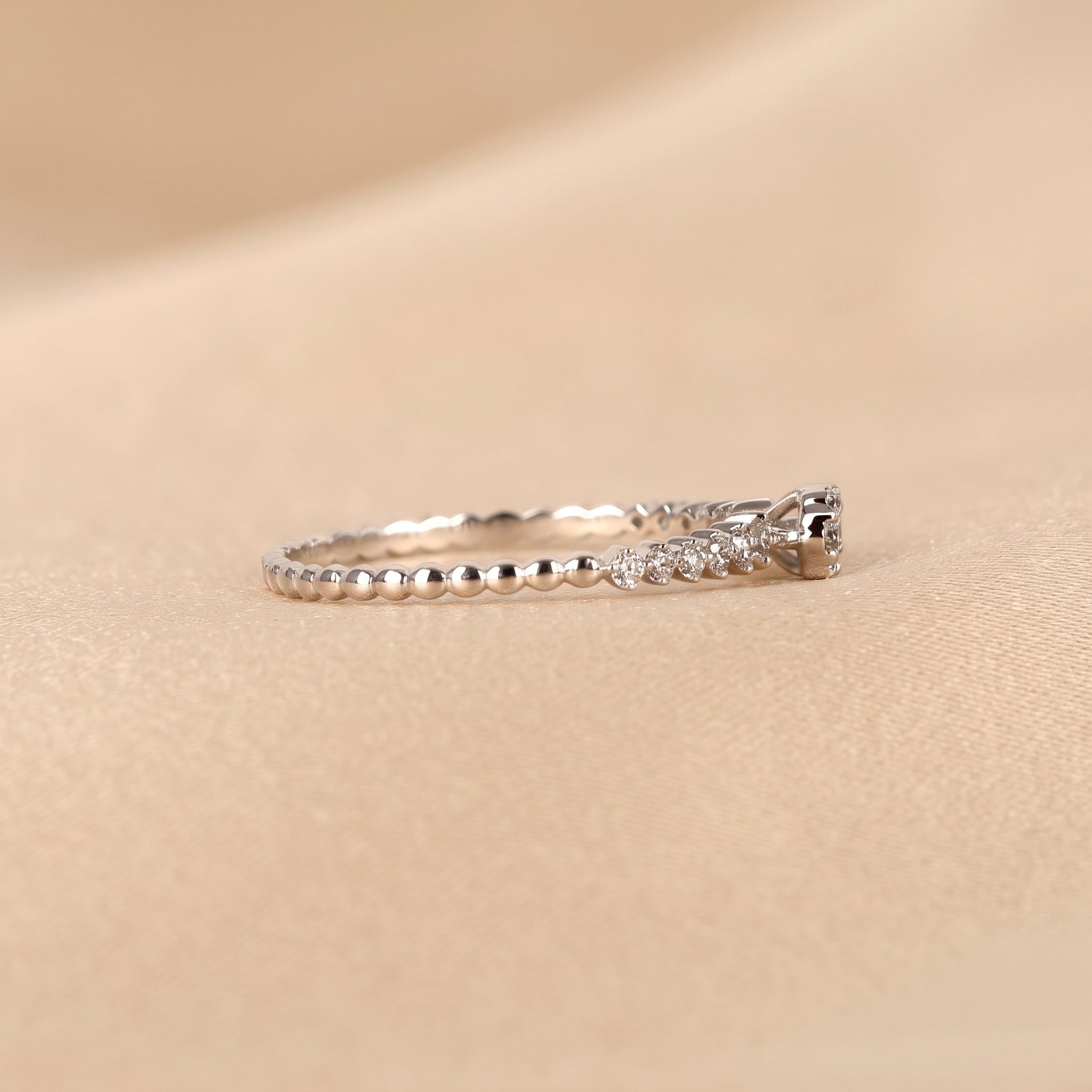 Round Cut Lab Grown Diamond Side Stone Ring in 18K White Gold 0.20 CTW