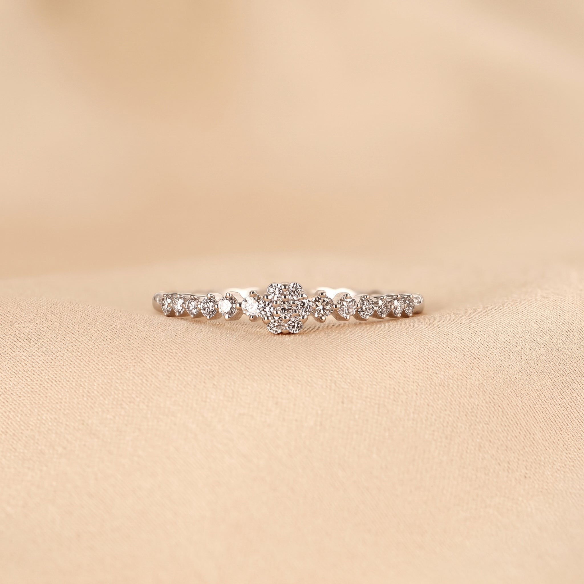 Round Cut Lab Grown Diamond Side Stone Ring in 18K White Gold 0.20 CTW