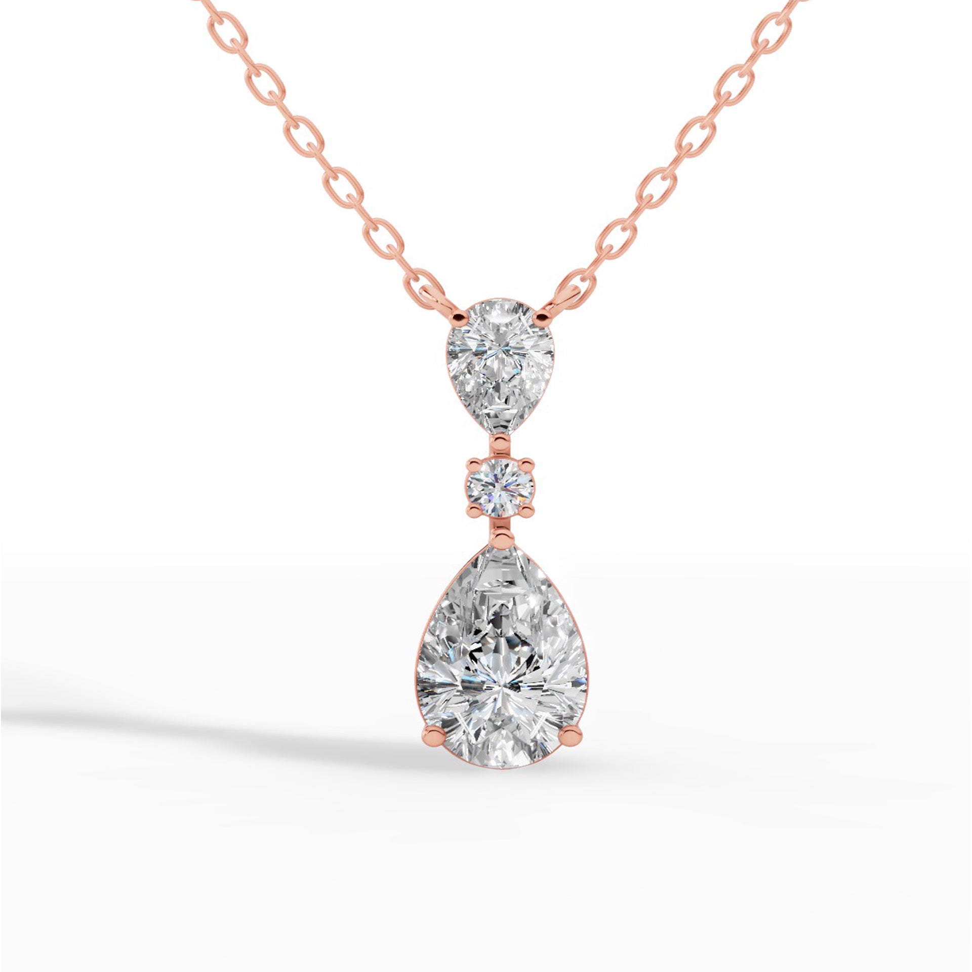 Tear Drop Three Stone Necklace Embracing Perfect Pear And Round Cut With Chain 10K Rose Gold 2.5 CTW