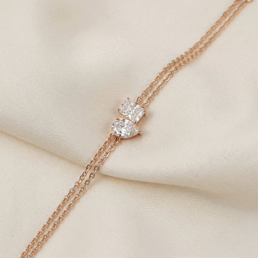 Toi Et Moi Elongated Prong Pear & Emerald Cut Delicate Double-Chain Bracelet Lab Grown Diamonds 10K Rose Gold 0.9 CTW