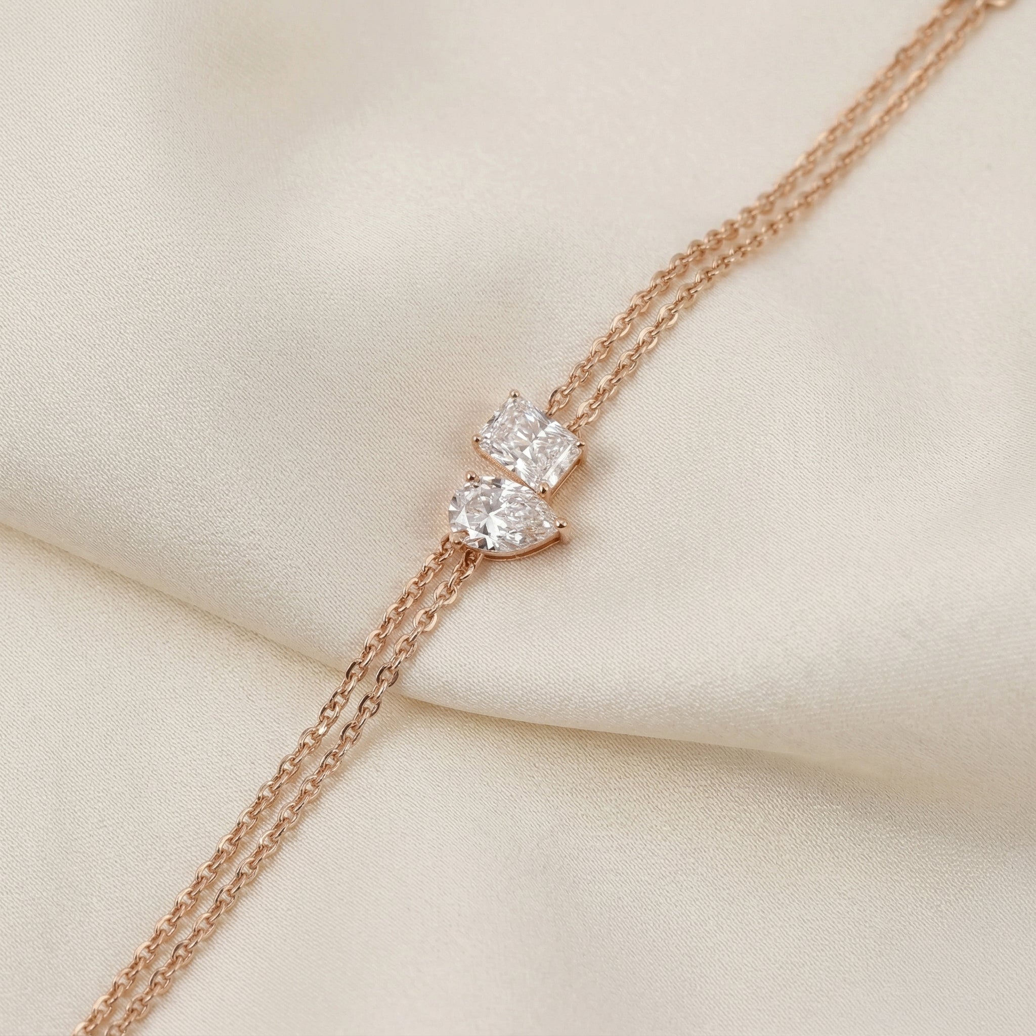 Toi Et Moi Elongated Prong Pear & Emerald Cut Delicate Double-Chain Bracelet Lab Grown Diamonds 10K Rose Gold 0.9 CTW