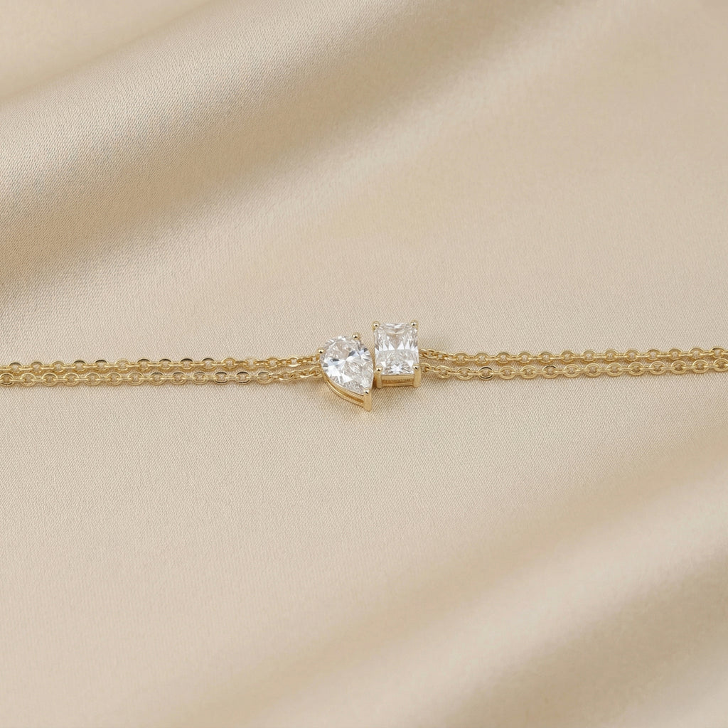 Toi Et Moi Elongated Prong Pear & Emerald Cut Delicate Double-Chain Bracelet Lab Grown Diamonds 14K Yellow Gold 0.9 CTW