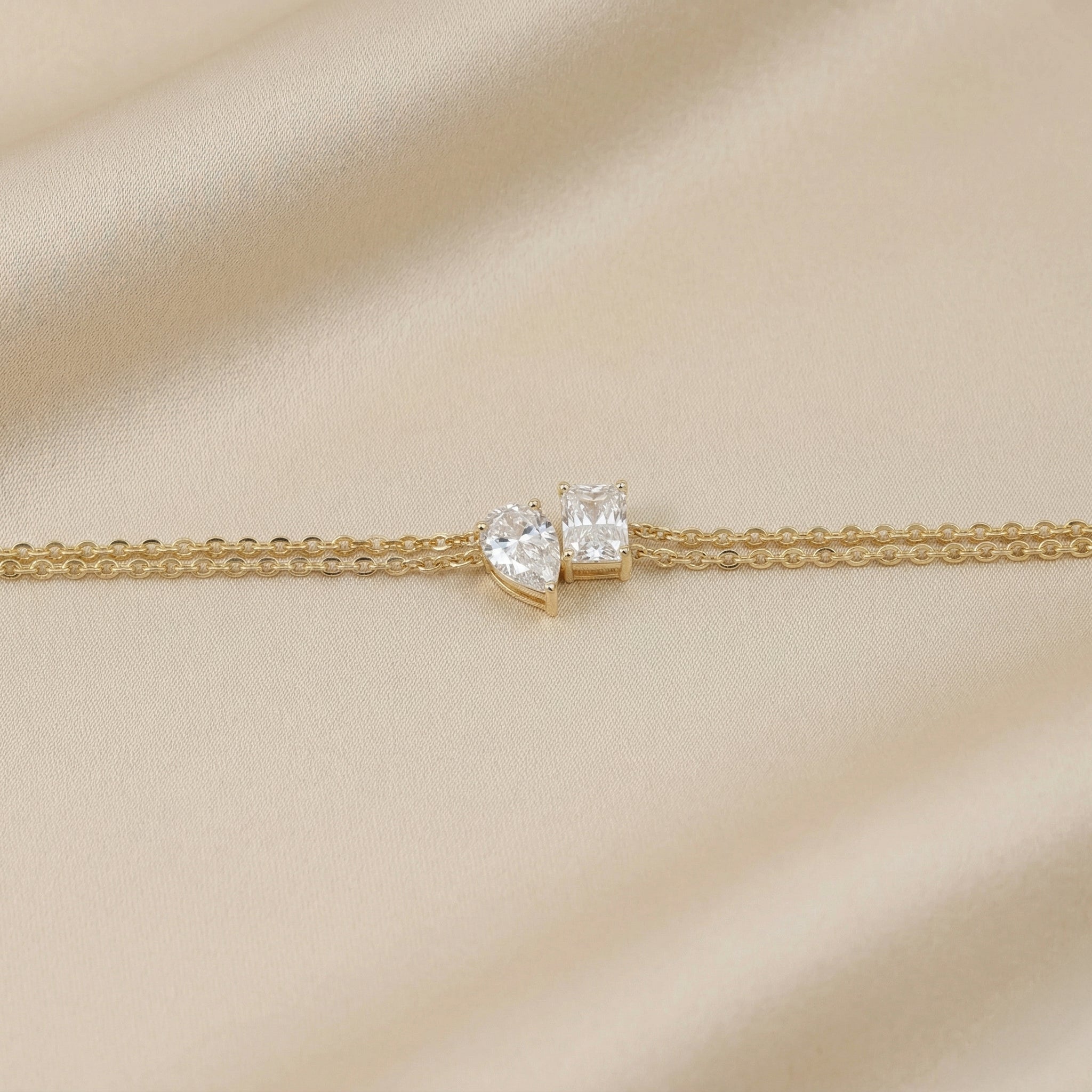 Toi Et Moi Elongated Prong Pear & Emerald Cut Delicate Double-Chain Bracelet Lab Grown Diamonds 18K Yellow Gold 0.9 CTW