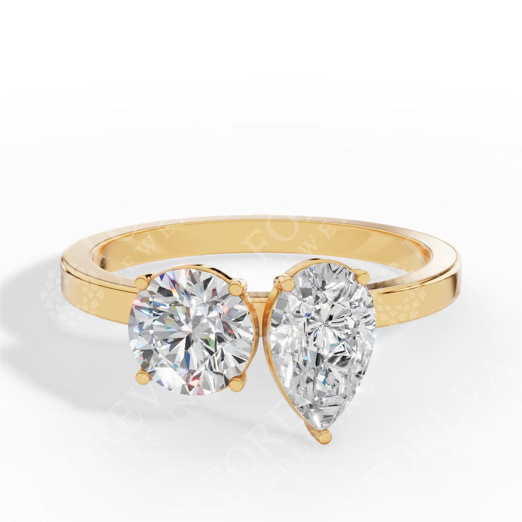 Toi Et Moi Pear And Round Cut Lab Grown Diamond Ring yellow gold